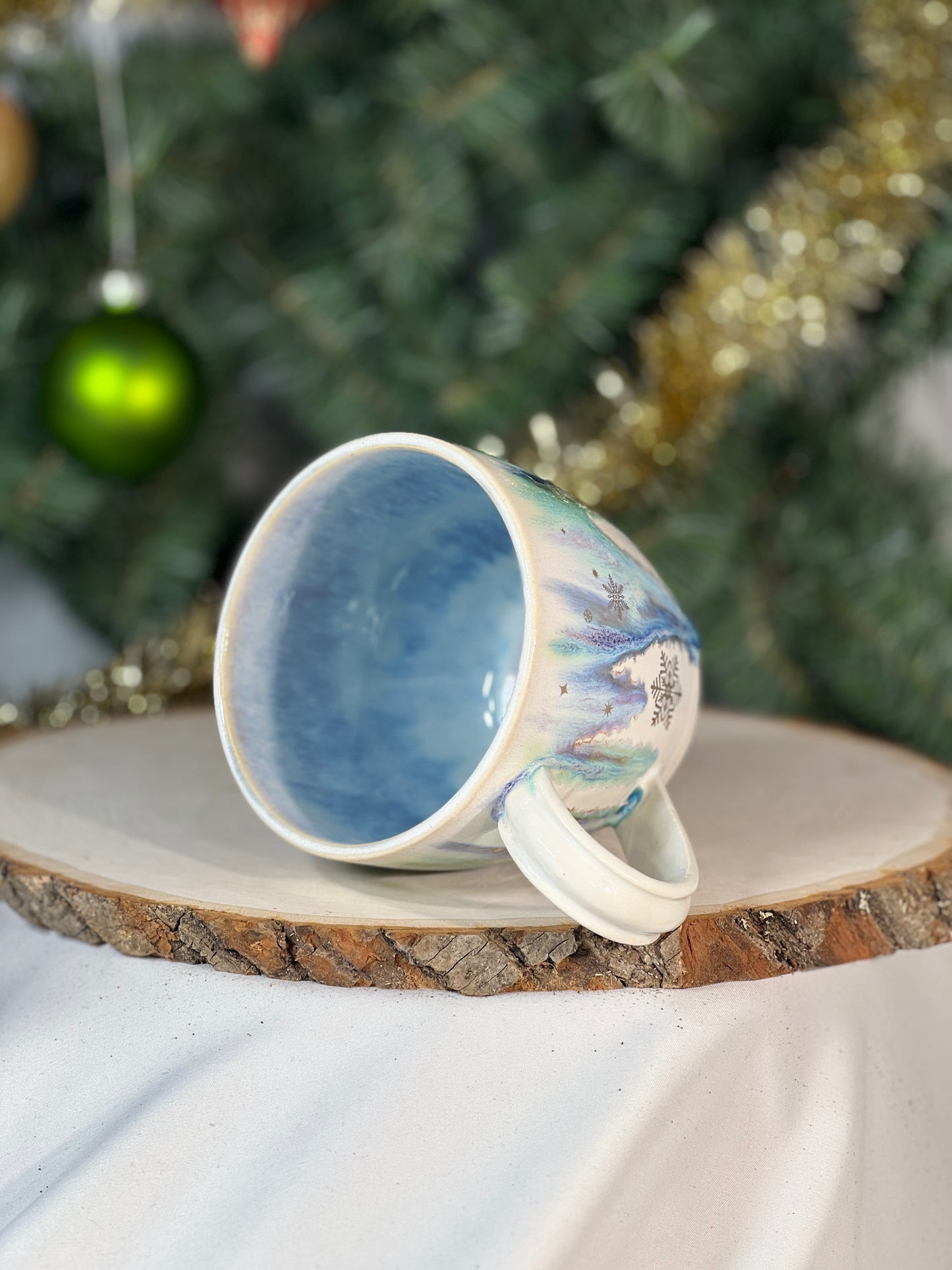 Cascading colors 12 oz mug w gold luster snowflakes