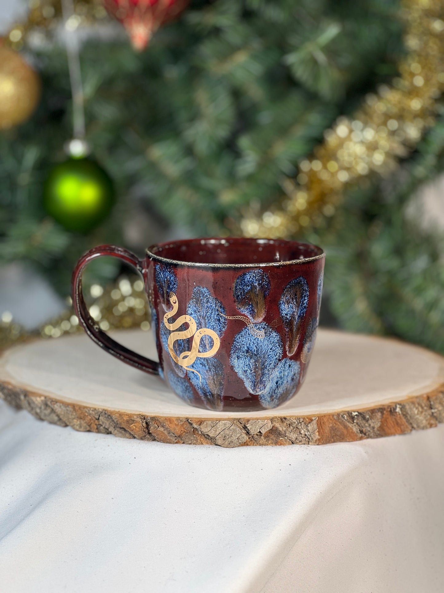 Red 12oz mug with gold luster snakes